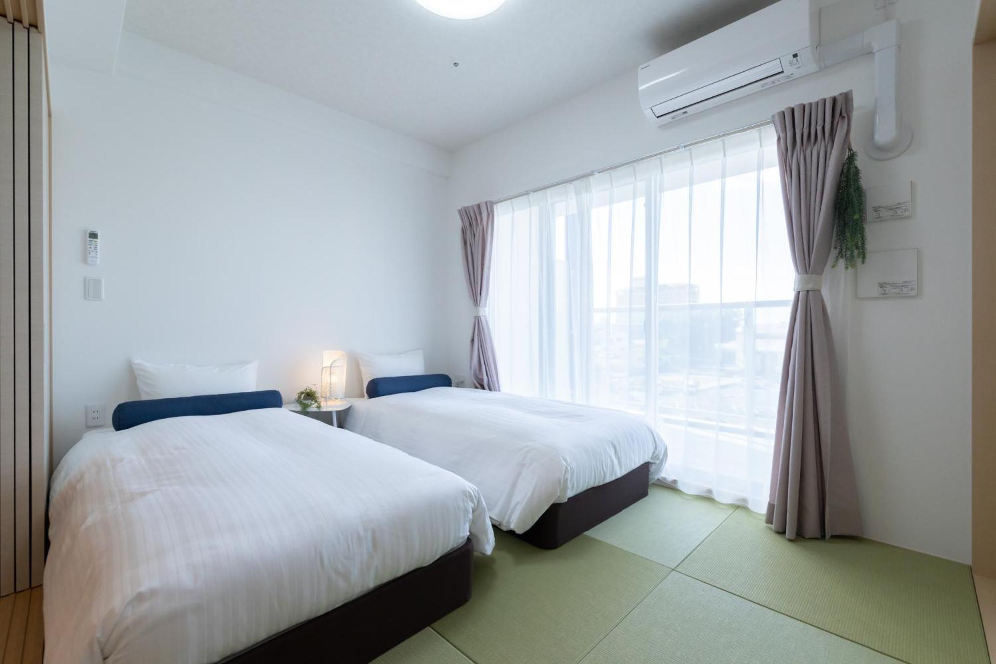 Aparthotel クリスタルエグゼ南紀白浜2 Shirahama Zimmer foto